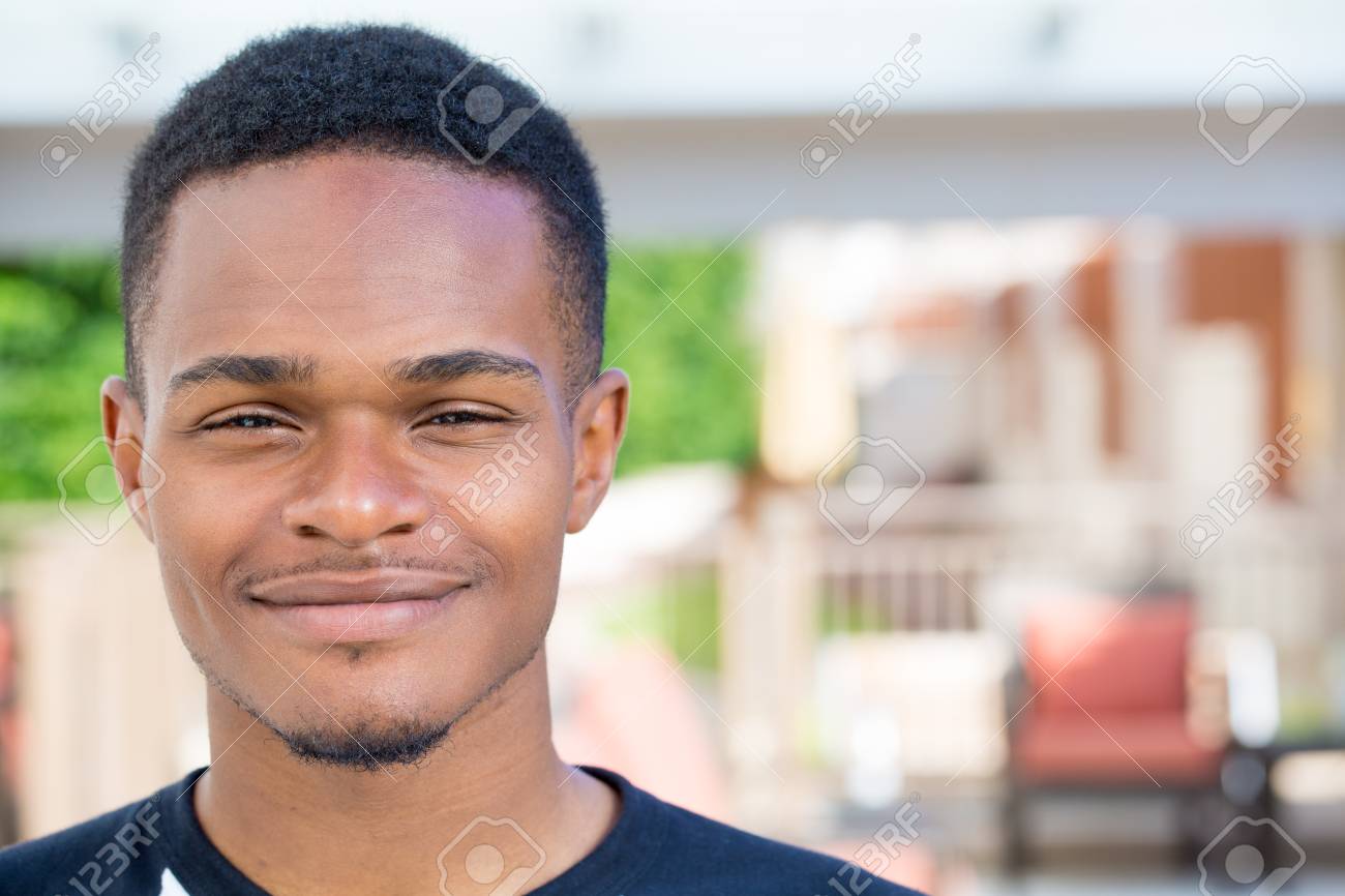 closeup headshot portrait of fine young man undergrad student