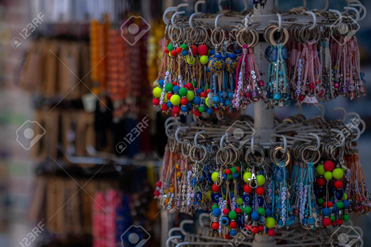 Many Various Colorful Keychains. Keychain Collection Souvenir Key