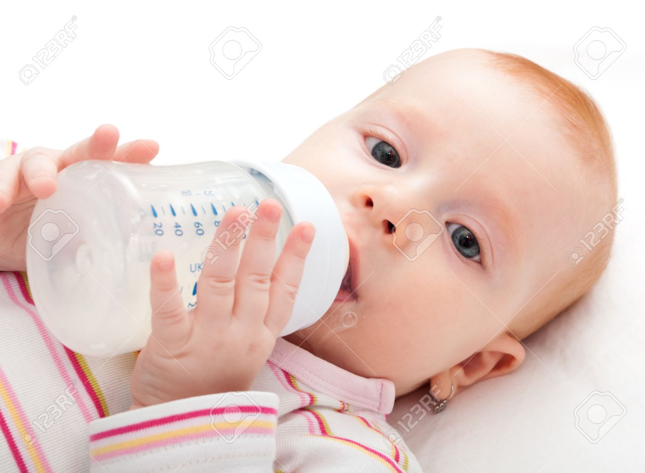 baby drinking milk from bottle