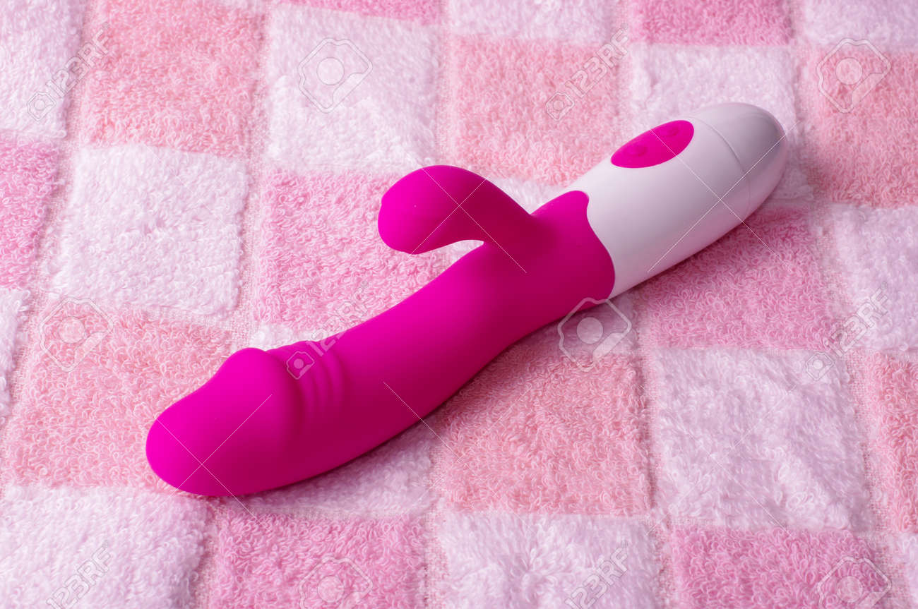 Pink Color Dildo Vibrator. Adult Sex Toy With G-spot Simulation Stock  Photo, Picture and Royalty Free Image. Image 128413235.