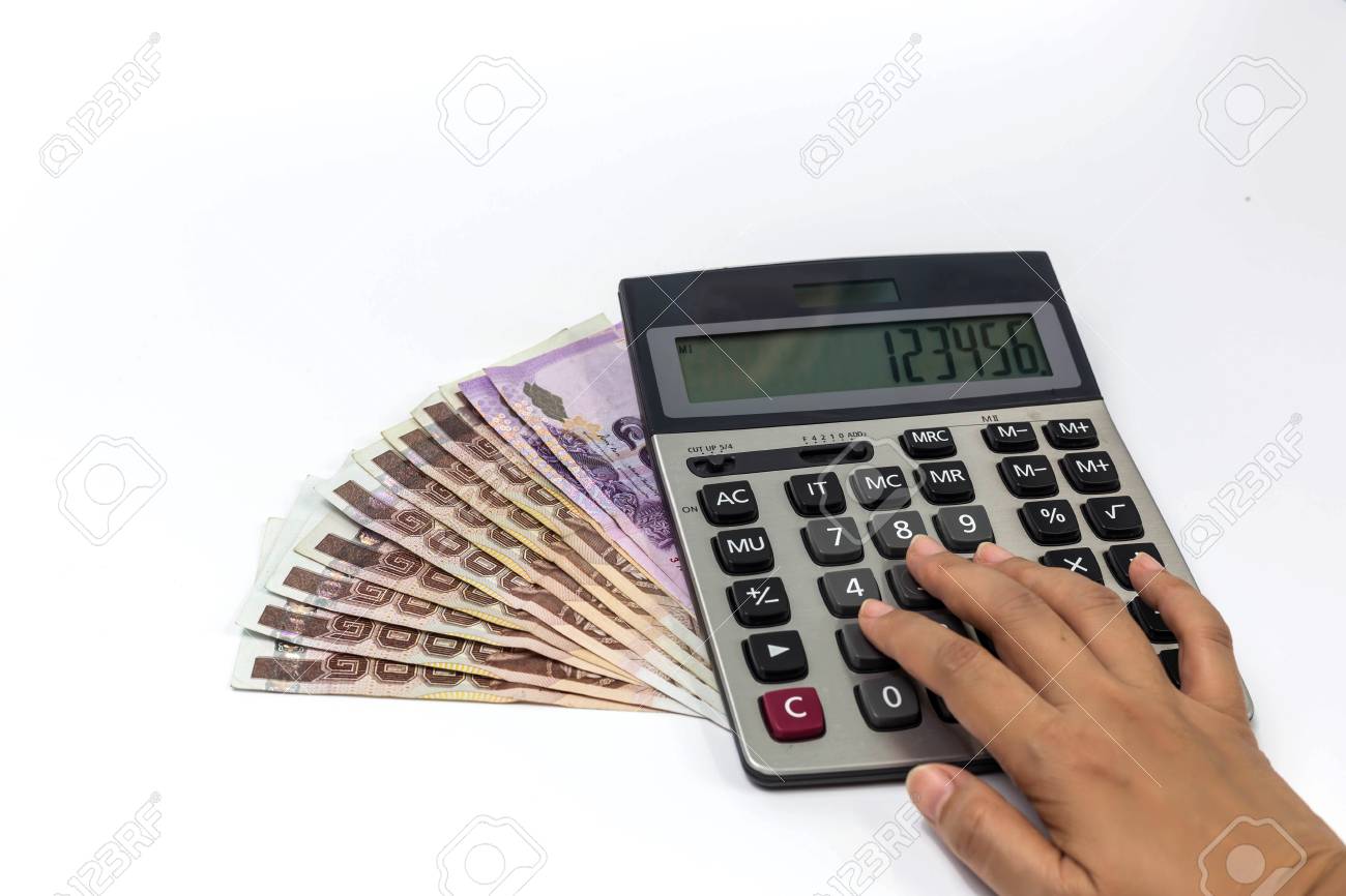 hand woman using calculator with money on white background stock calculator with