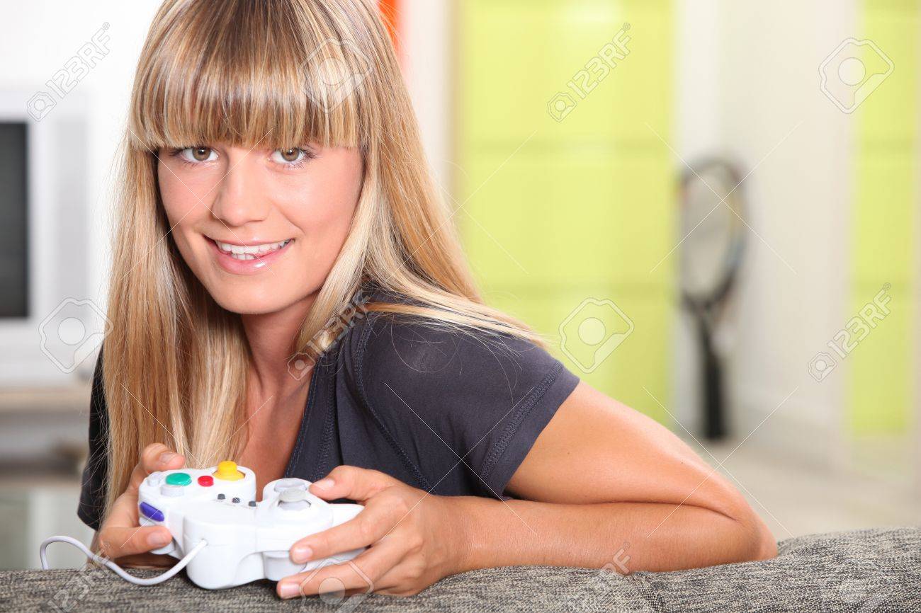 Blond Teenager Playing Video Games Stock Photo 12219795 Blond Teenager Playing Video Games Stock Photo 12219795