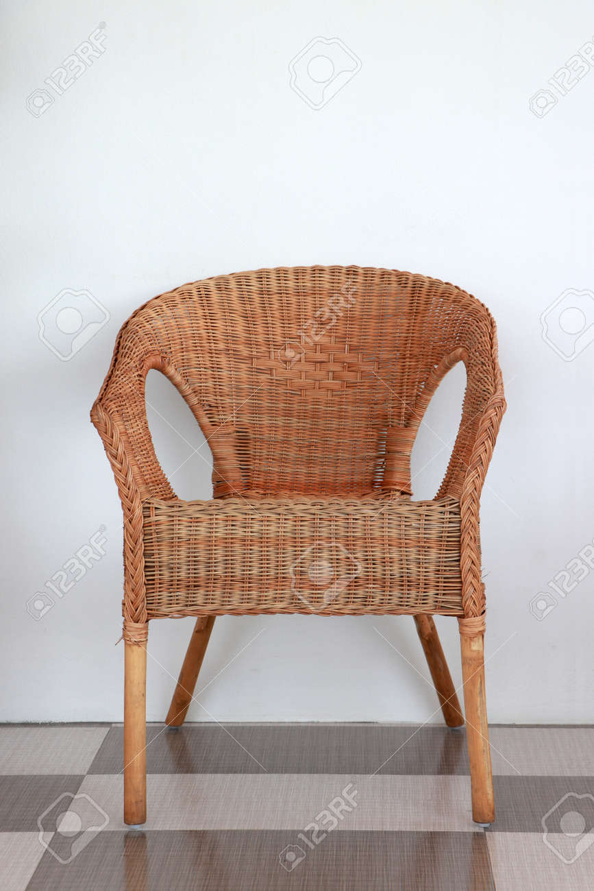 Rattan chair Cane chair or Wicker chair on the floor with white wall. - 160091995 Rattan chair Cane chair or Wicker chair on the floor with white wall. - 160091995