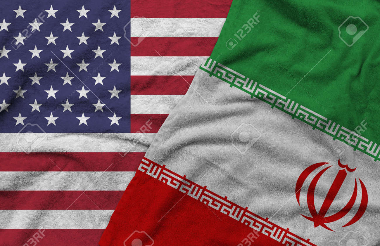 The American and Iran flags pattern on towel fabric are placed together. It is the concept of the relationship between the two countries. - 165993606 The American and Iran flags pattern on towel fabric are placed together. It is the concept of the relationship between the two countries. - 165993606