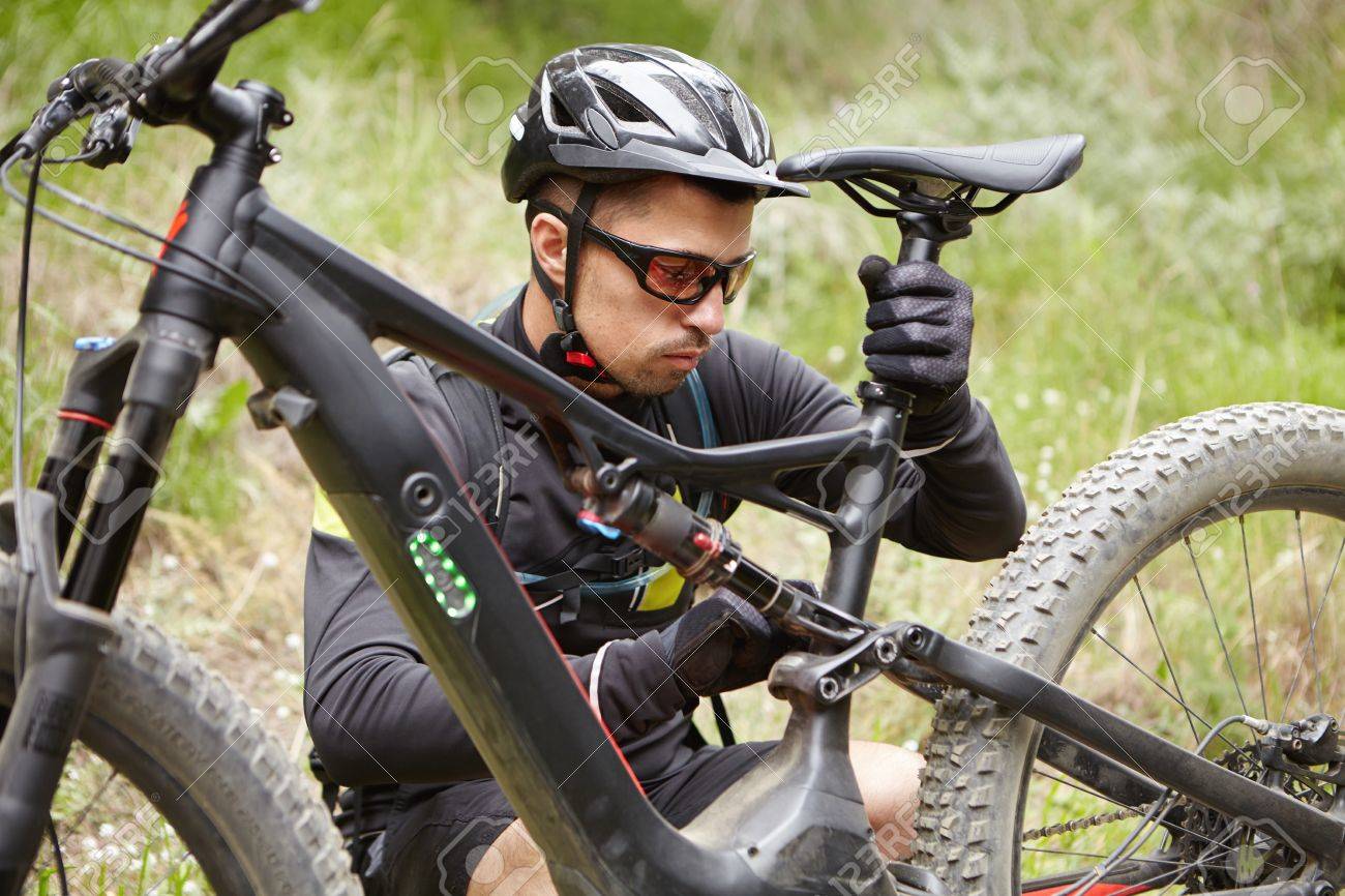 Battery Powered Bicycles >> Close Up Shot Of Young Caucasian Rider Wearing Protective Gear Battery Powered Bicycles >> Close Up Shot Of Young Caucasian Rider Wearing Protective Gear