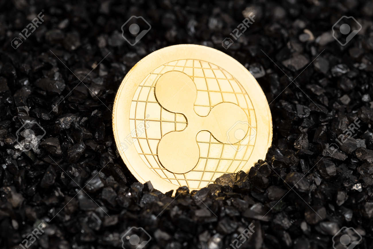 검은 자갈 배경의 리플 Xrp 코인 암호화폐 블록체인 돈 로열티 무료 사진, 그림, 이미지 그리고 스톡포토그래피. Image  176825116