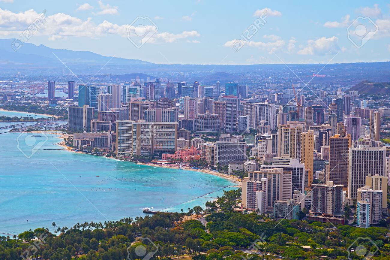 Honolulu city skyline reflection in ocean, Hawaii, United States Stock  Photo - Alamy, image size:1300x866