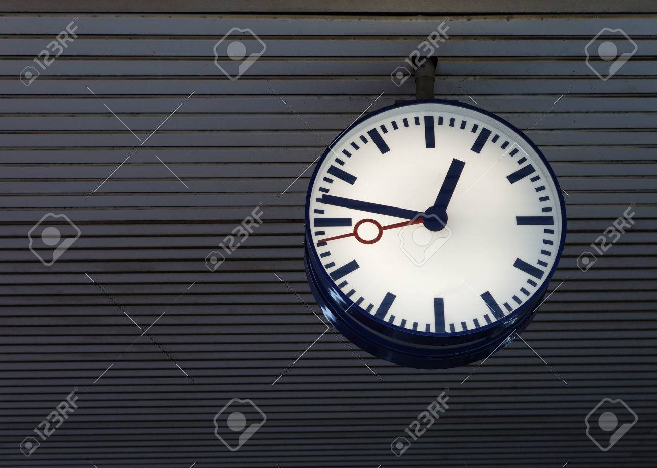 station clock hanging from