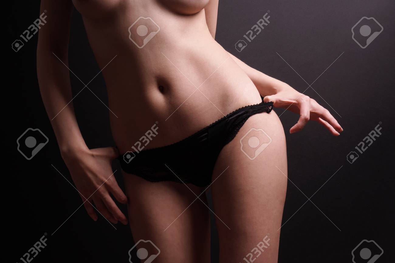 Strip Tease, Midsection Of Female Body, Pulling Down Cotton Panties Stock  Photo, Picture and Royalty Free Image. Image 88486052.