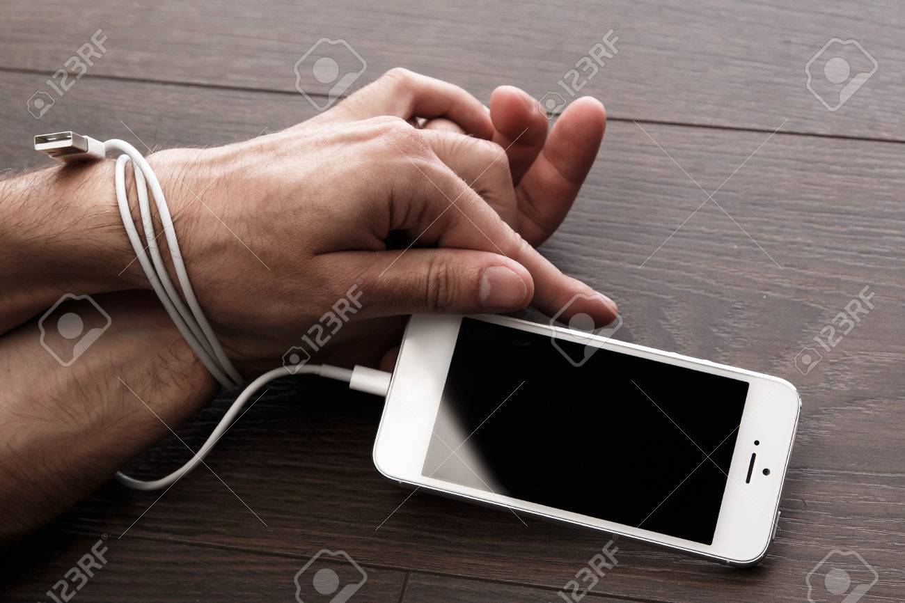 Male hands and smartphone. Addiction to internet and social networks - 46046548 Male hands and smartphone. Addiction to internet and social networks - 46046548
