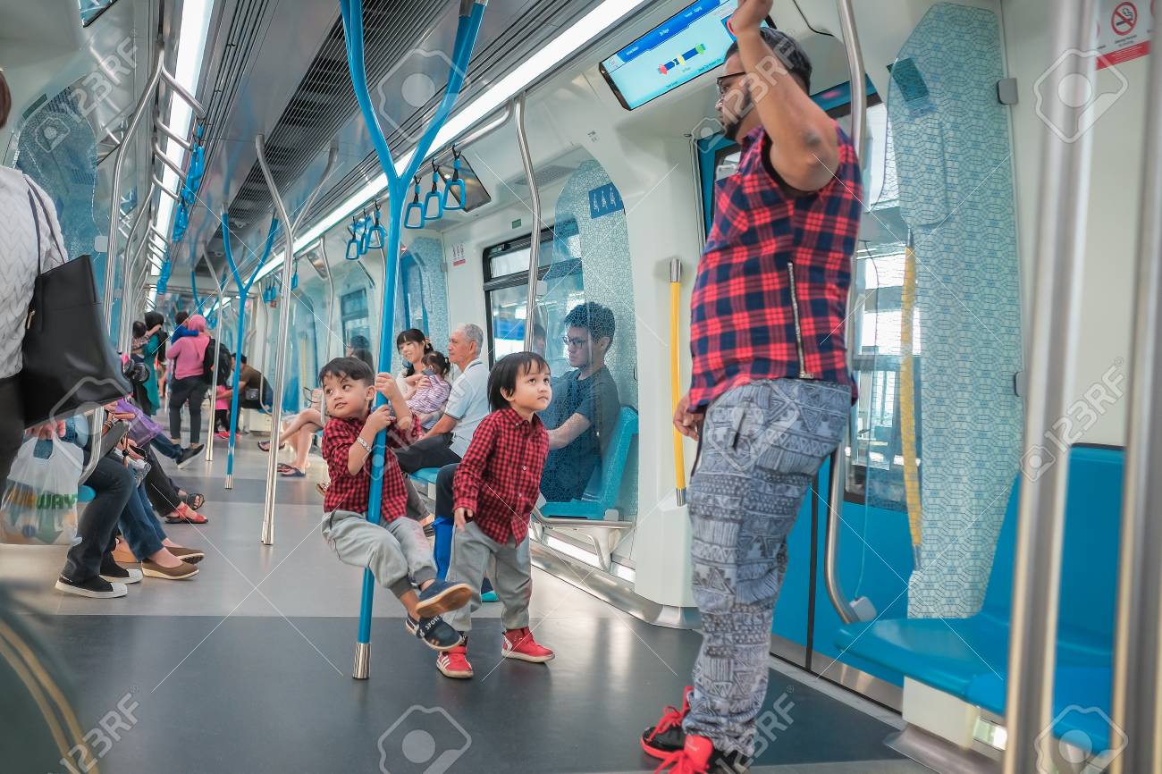 Kuala Lumpur Malaysia December 31st 2017 Asian Malay Little Boys Playing Pole Inside A Mrt Transit In Kuala Lumpur City Malaysia Stock Photo Picture And Royalty Free Image Image 119861764
