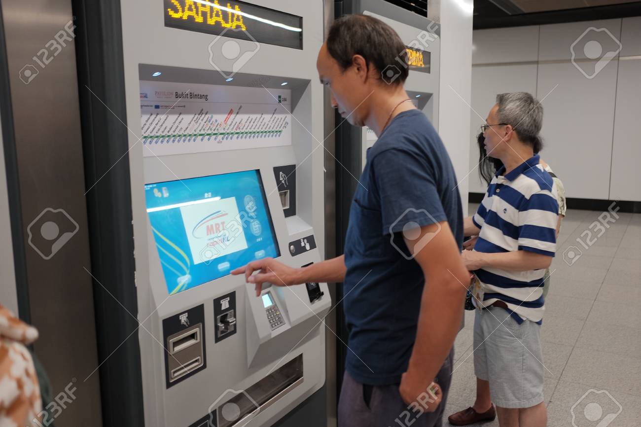 Kuala Lumpur Malaysia December 31st 2017 Passenger Buying Ticket From Vending Machines Located At Bukit Dukung Mass Rapid Transit Mrt Stations Stock Photo Picture And Royalty Free Image Image 120679574