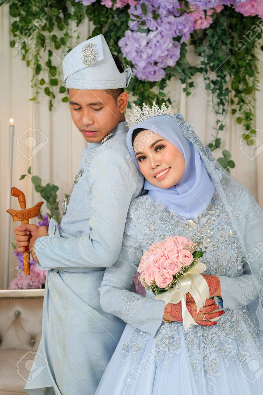 Indoor Shooting For Malay Wedding The Bride And Groom Wearing Malay Traditional Cloth In Marriage Ceremony Happy Family Concept Stock Photo Picture And Royalty Free Image Image 159300511