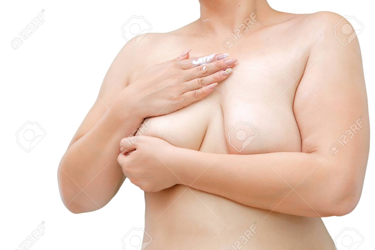 A Woman With Overweight And Saggy Breasts Smears Cream On The Chest Stock  Photo, Picture and Royalty Free Image. Image 125454533.