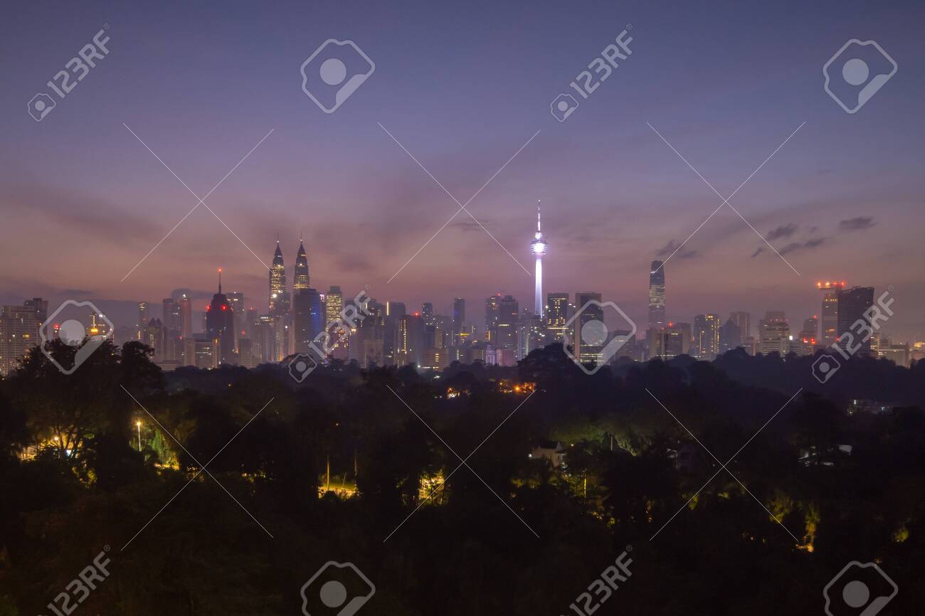 view of beautiful sunrise overlooking national landmark of Malaysia - 119349932 view of beautiful sunrise overlooking national landmark of Malaysia - 119349932