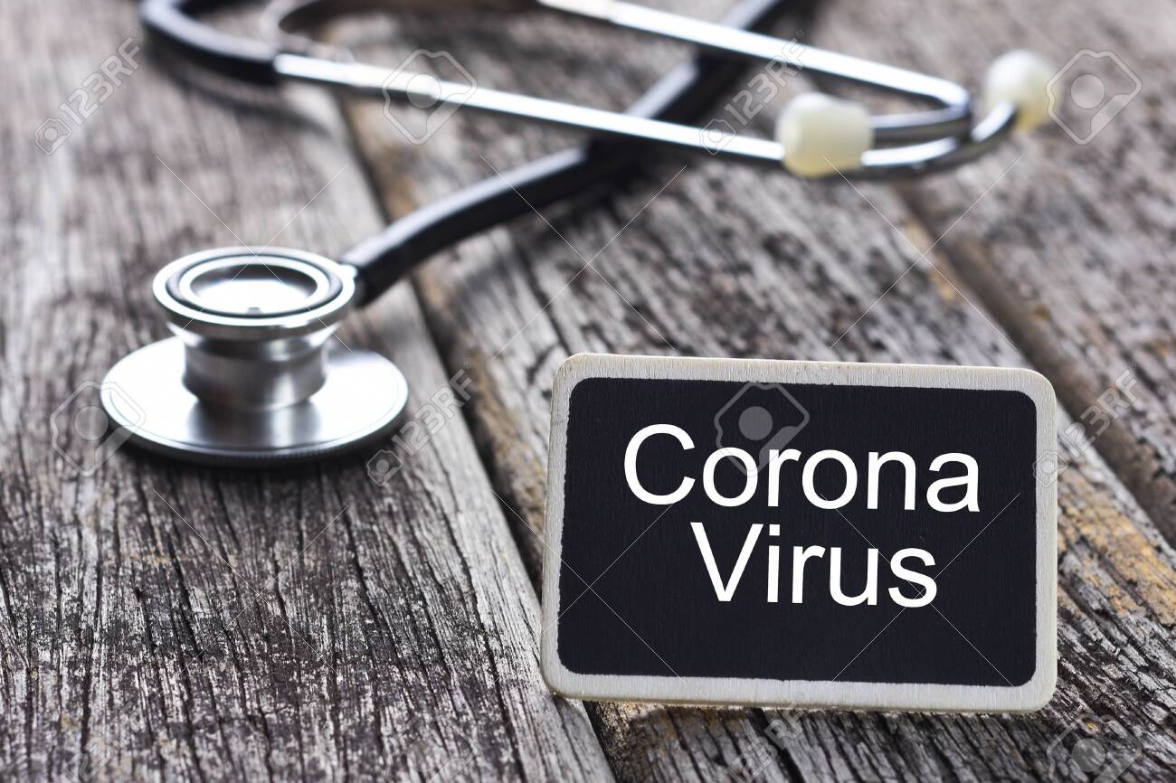 CORONA VIRUS word written on blackboard with Stethoscope on wood background - 143214725 CORONA VIRUS word written on blackboard with Stethoscope on wood background - 143214725