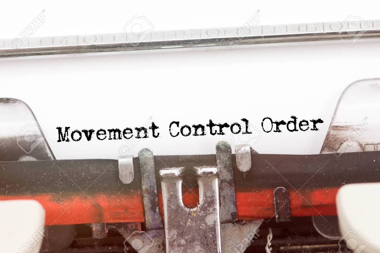 MOVEMENT CONTROL ORDER word typed on a Vintage Typewriter - 143214731 MOVEMENT CONTROL ORDER word typed on a Vintage Typewriter - 143214731