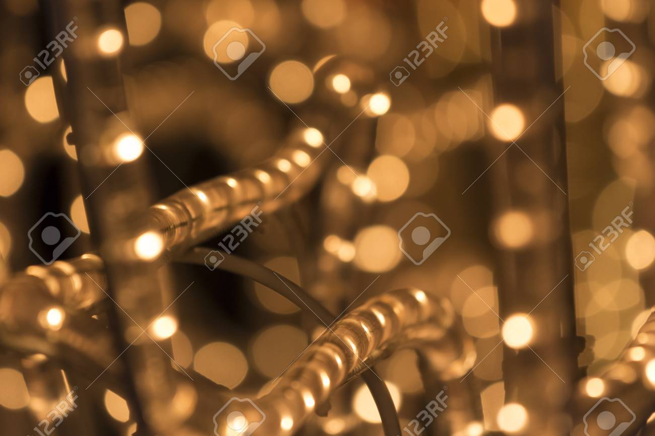 クリスマス ライトの背景 光沢のあるオレンジ色の黄金の光 クリスマス映像に最適 の写真素材 画像素材 Image