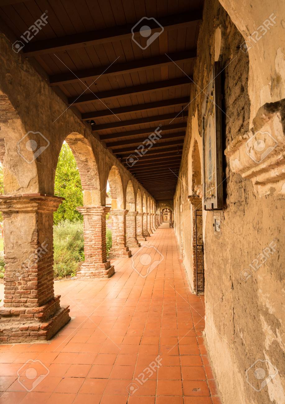 old brick arches around the cloisters of the mission at san juan