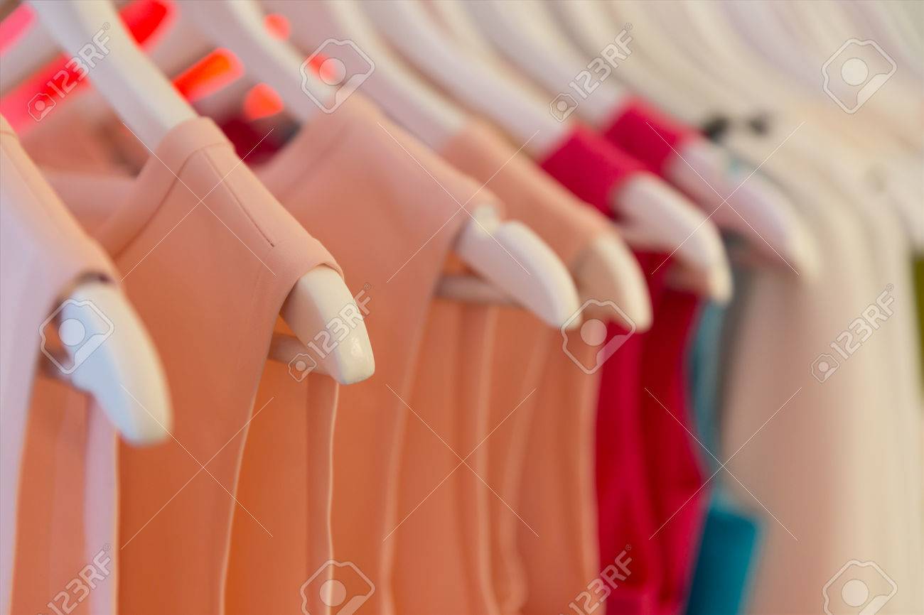 Closeup View Of Dresses On Clothes Hangers With Very Shallow