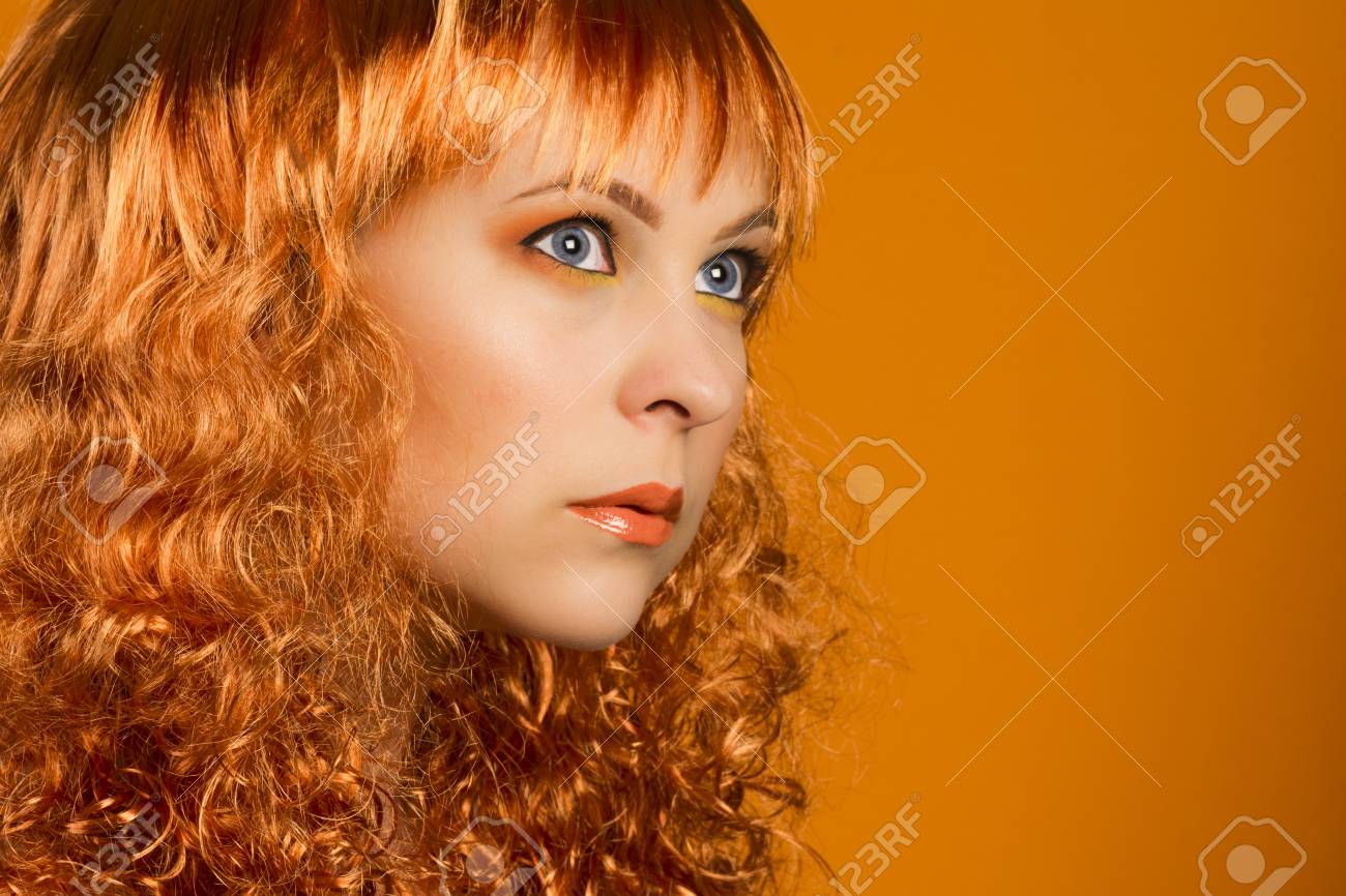 Beauty Portrait Of Woman With Ginger Hair Color Curly Hairstyle