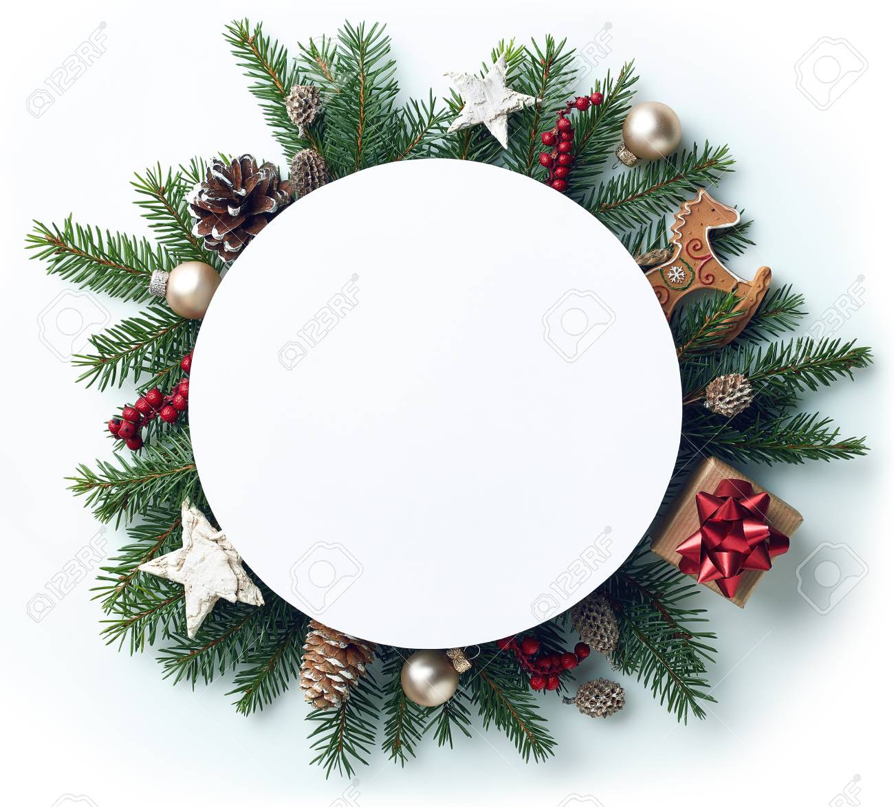 Round Frame Of Christmas Tree Branches And Decorations With Blank ...