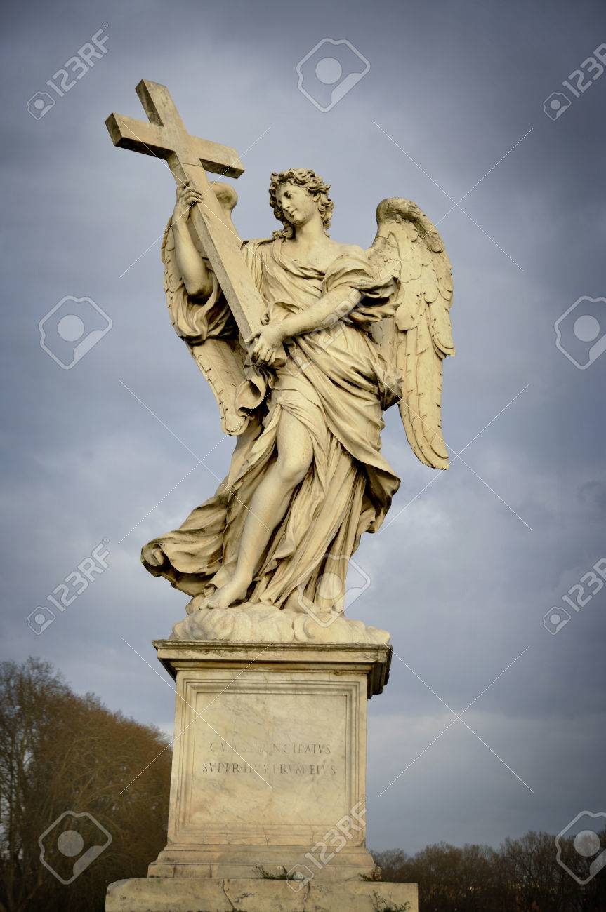 Marble Statue Of Angel With Cross, On Saint Angelo Bridge In Rome
