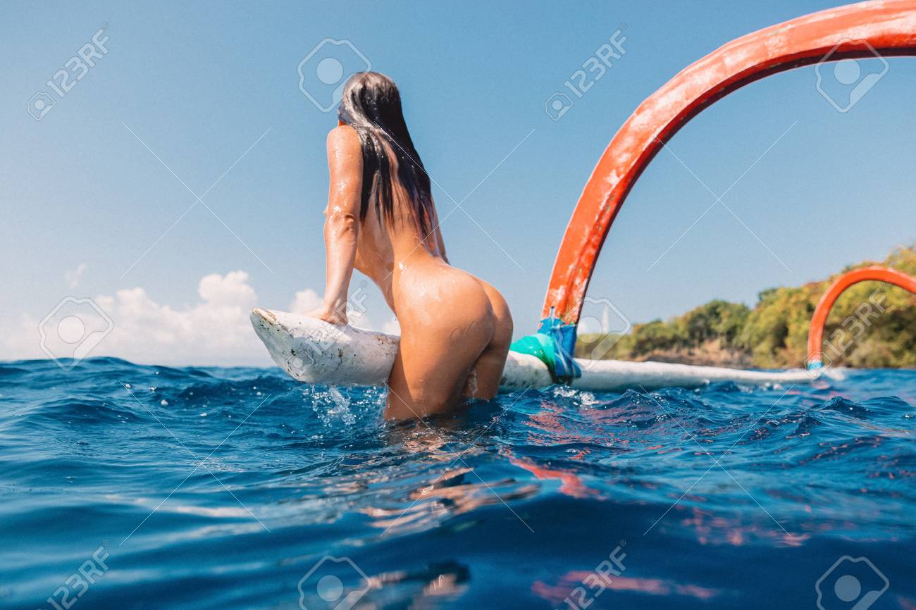 Beautiful woman with perfect body in blue ocean - 114494541 Beautiful woman with perfect body in blue ocean - 114494541