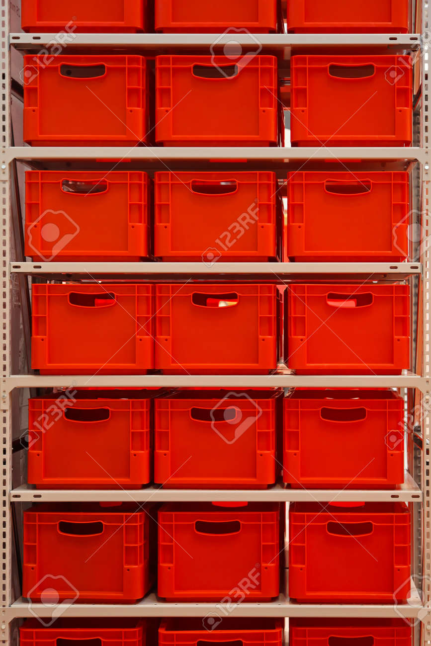 Shelf With Red Plastic Crates In Warehouse Stock Photo Shelf With Red Plastic Crates In Warehouse Stock Photo