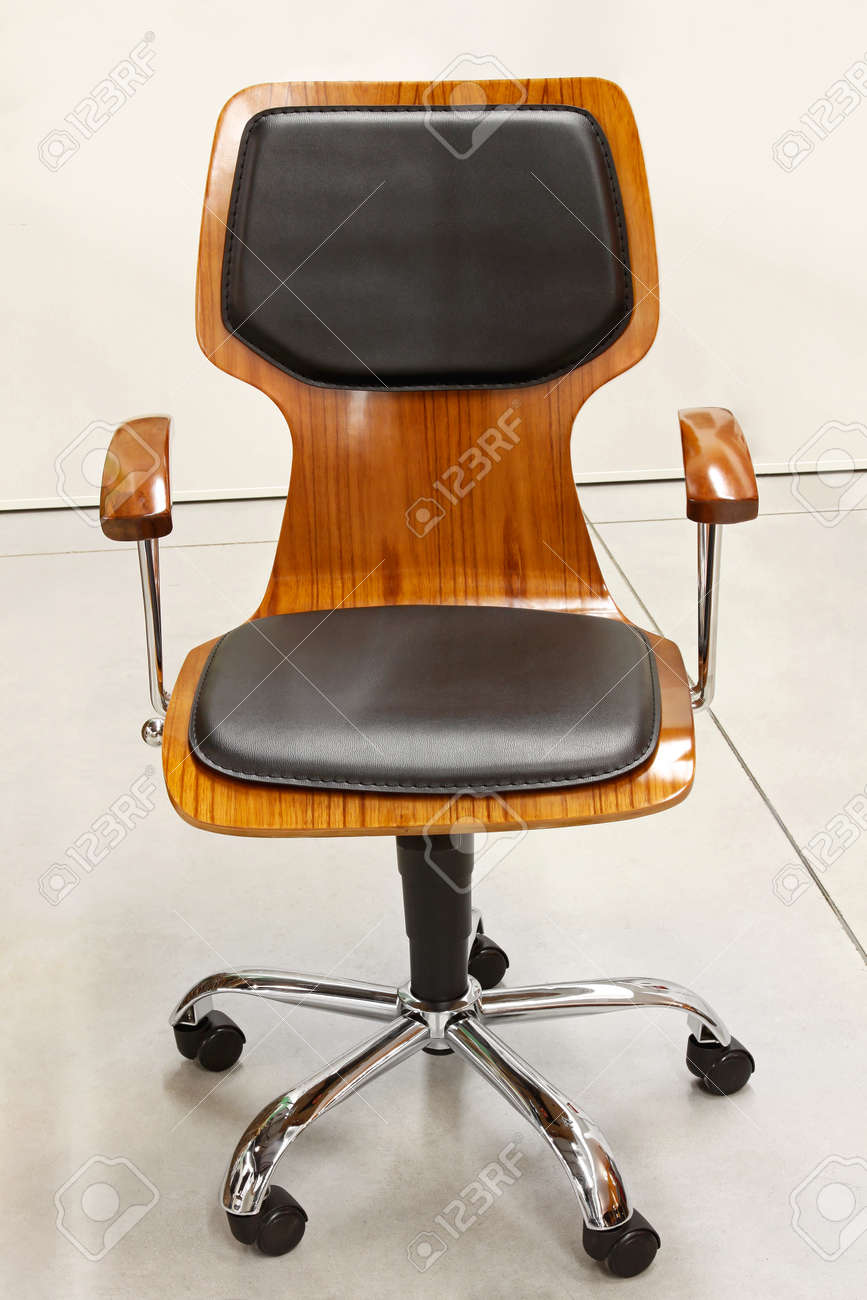 Modern Wooden Office Chair With Leather Cushions Stock Photo