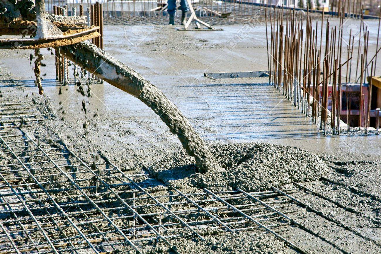 Concrete Pouring During Commercial Concreting Floors Of Buildings At  Construction Site Stock Photo, Picture and Royalty Free Image. Image  12192474.