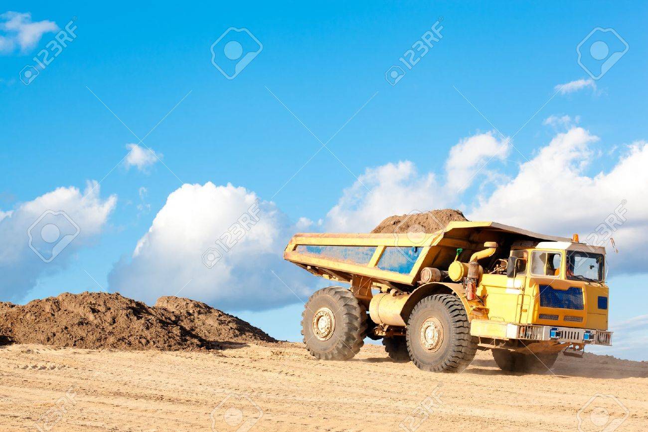 Dump Truck With Sand Or Soil In A Body At A Construction Site Stock Photo Picture And Royalty Free Image Image 15138895