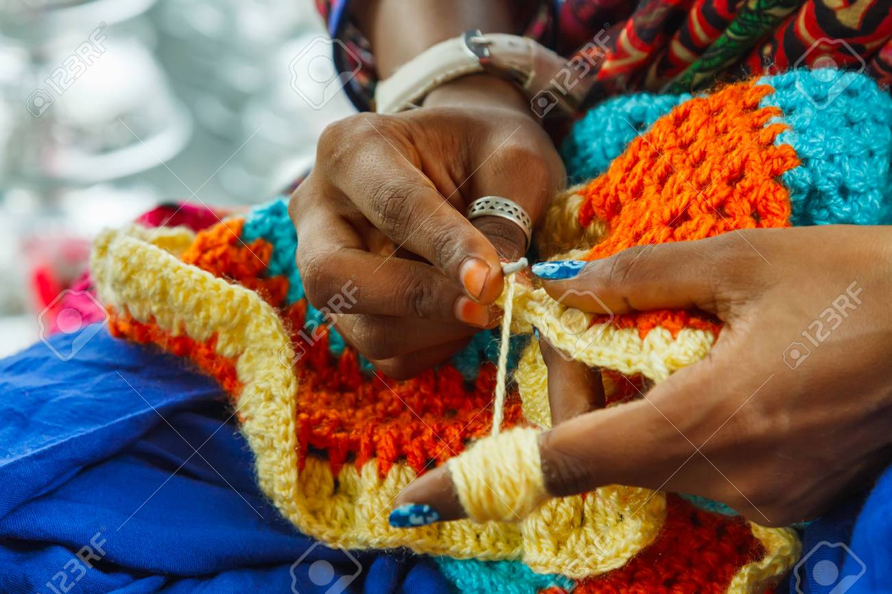 Hands Of Indian Woman Knitting A Mat Stock Photo, Picture and Royalty Free  Image. Image 64550357.