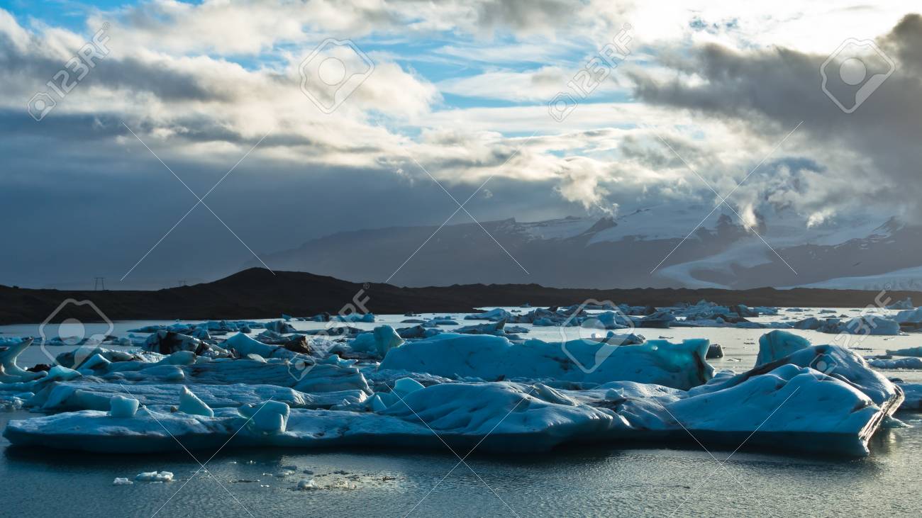 Icebergs Are Melting At Jokulsarlon Glacier Lagoon At Summer Sunset,  Iceland Stock Photo, Picture and Royalty Free Image. Image 46015169., image size:1300x731