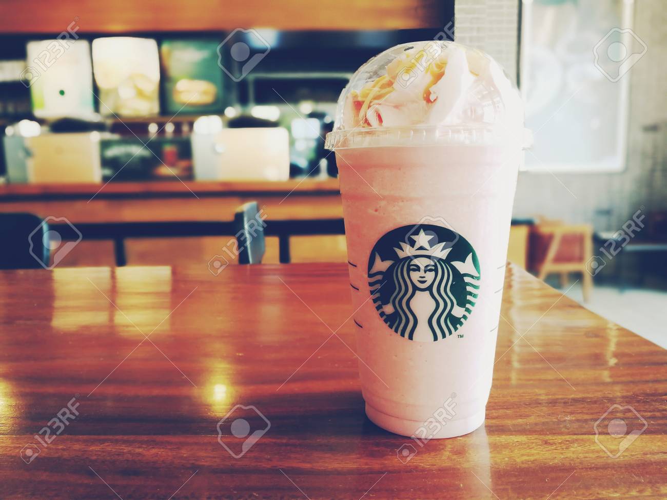 Bangkok Thailand July 30 2017 A Glass Of Starbucks Coffee Blended Beverages Caramel Cream Frappuccino With Raspberry Syrup And Strawberry Whipped Cream Stock Photo Picture And Royalty Free Image Image 85673105
