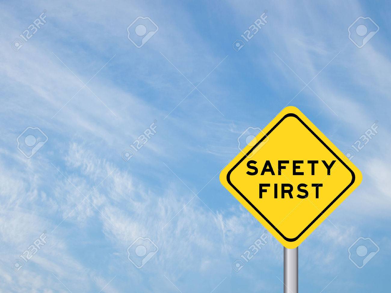 wording "Safety first" on yellow traffic sign on the blue sky - 57768829 wording "Safety first" on yellow traffic sign on the blue sky - 57768829