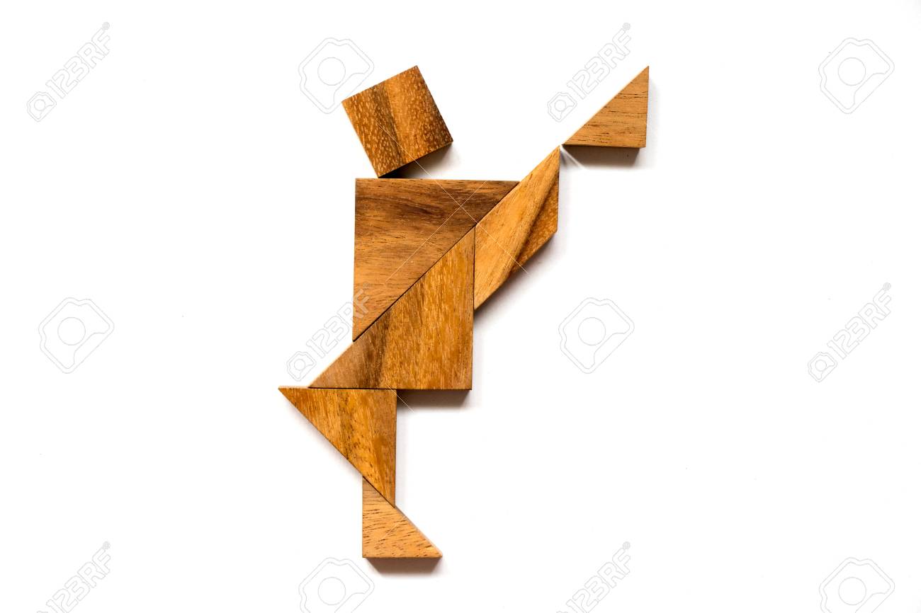 Wooden tangram puzzle in dancing man shape on white background - 80170805 Wooden tangram puzzle in dancing man shape on white background - 80170805