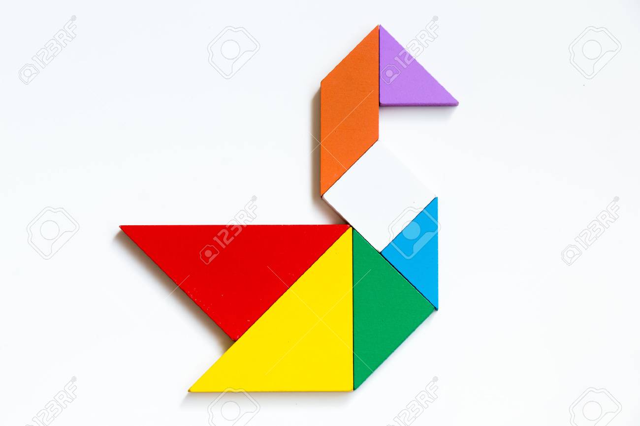 Colorful wood tangram puzzle in swan shape on white background - 88644849 Colorful wood tangram puzzle in swan shape on white background - 88644849