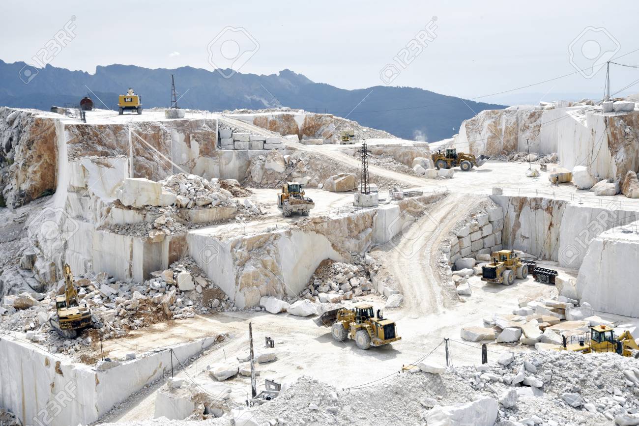 Carrara Marble Quarry In Italy With Bulldozers At Work Stock Photo, Picture And Royalty Free Image. Image 107520972.