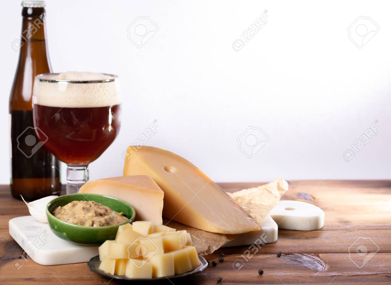 finger food usually served with glass of beer, cubes hard old Dutch cow and goat cheese with Dijon mustard - 108564133 finger food usually served with glass of beer, cubes hard old Dutch cow and goat cheese with Dijon mustard - 108564133