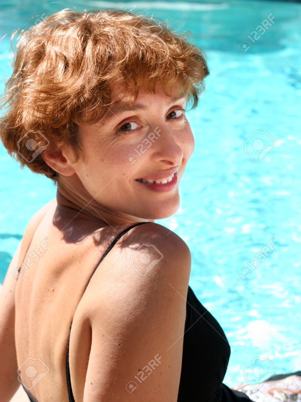 mature by the pool Mature by the pool