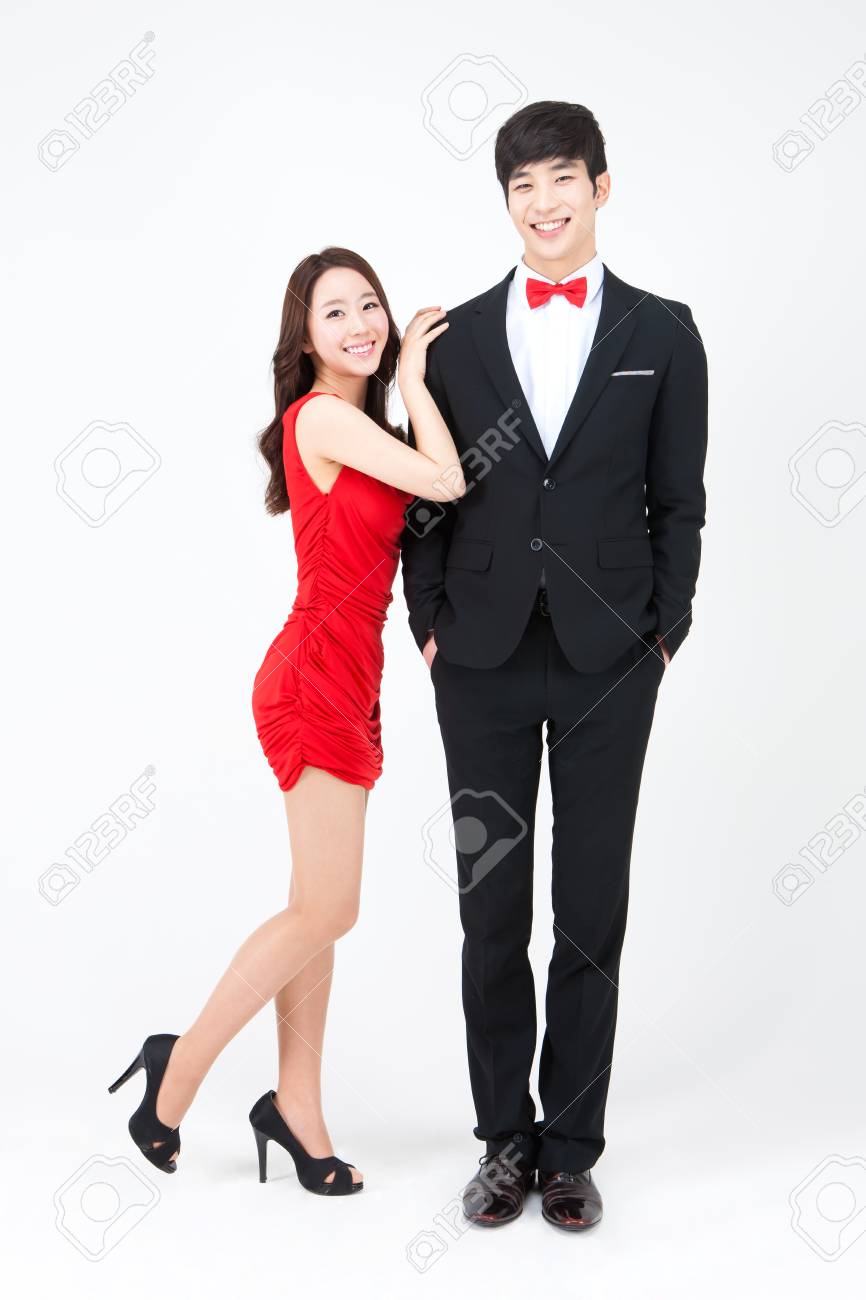 Portrait Of Asian Beautiful Woman Leaning On Her Boyfriends Shoulder Isolated On White Stock Photo Portrait Of Asian Beautiful Woman Leaning On Her Boyfriends Shoulder Isolated On White Stock Photo