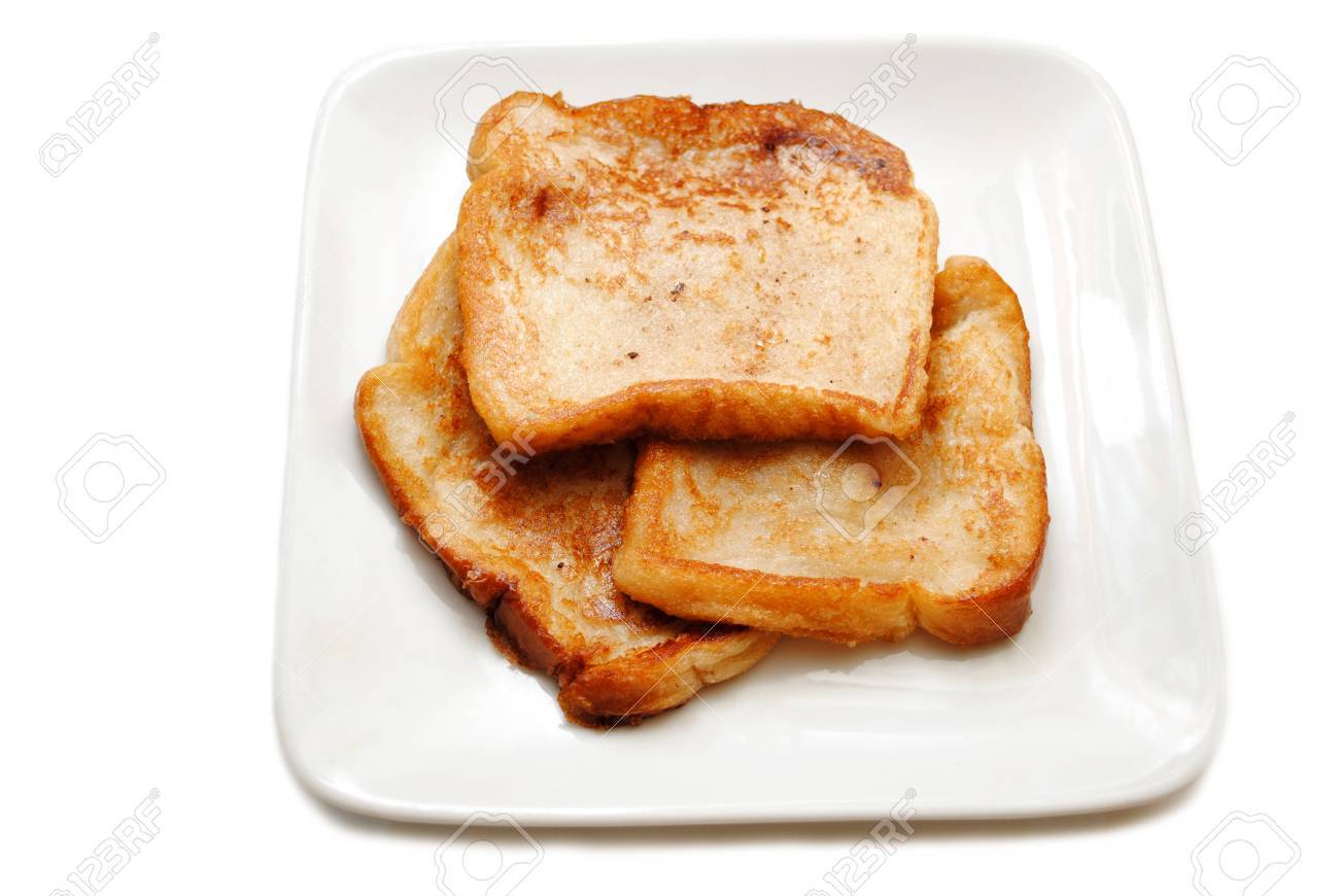 39780979-three-slices-of-french-toast-on-a-white-plate.jpg