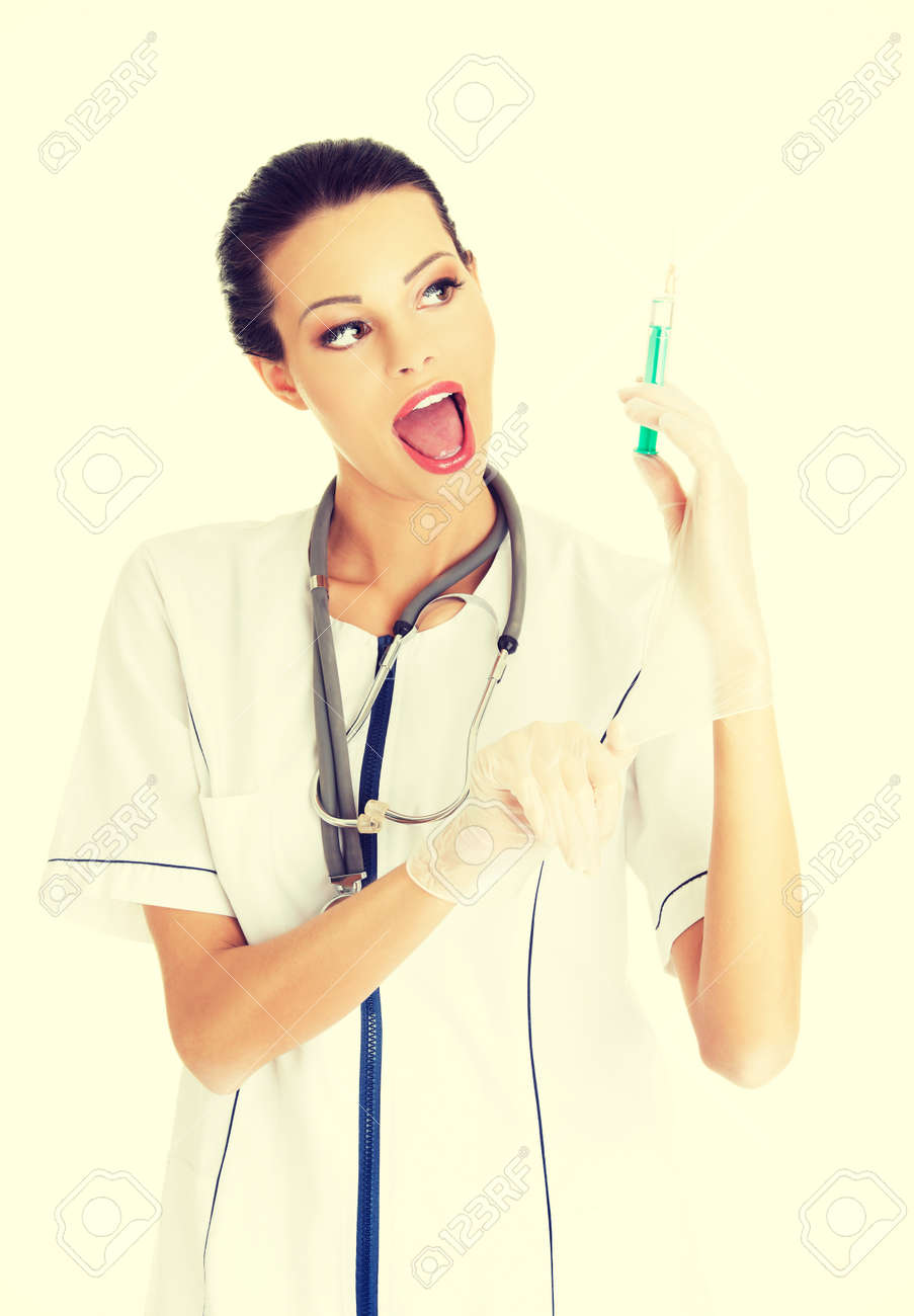 注射器を持つ若いハッピー ナース の写真素材 画像素材 Image