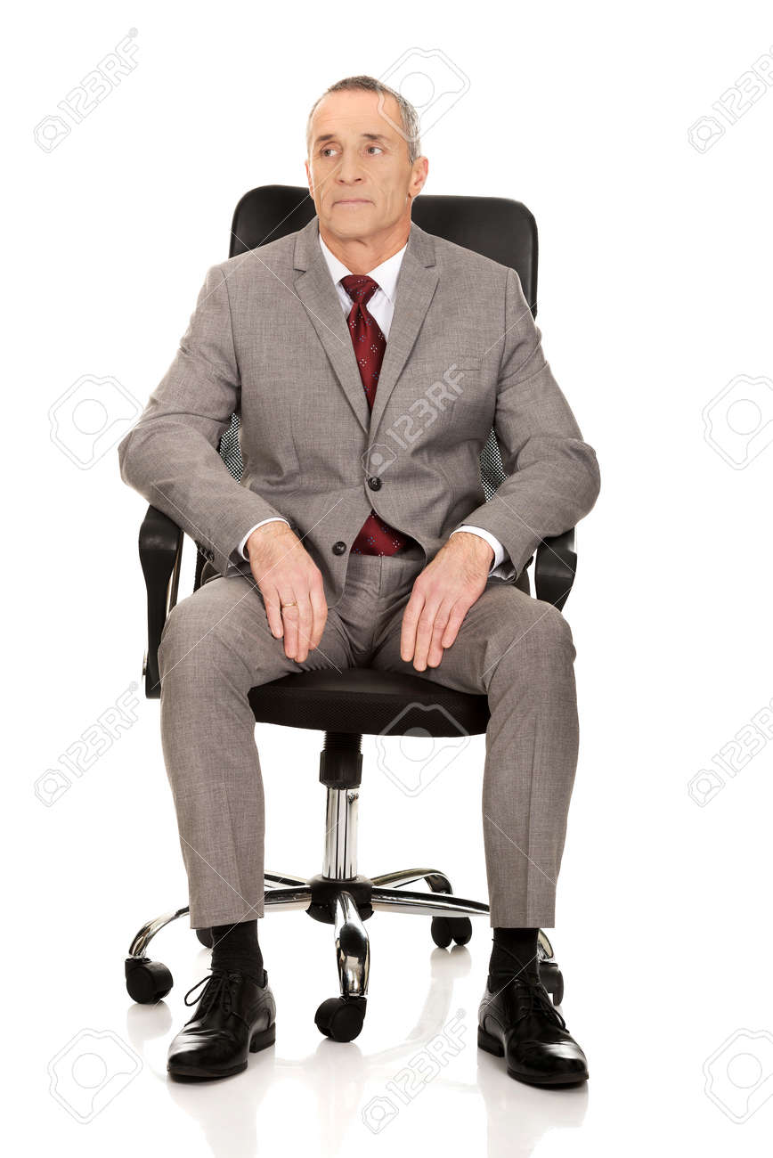 Front View Of Businessman Sitting On Armchair Stock Photo Picture And Royalty Free Image Image 36117853