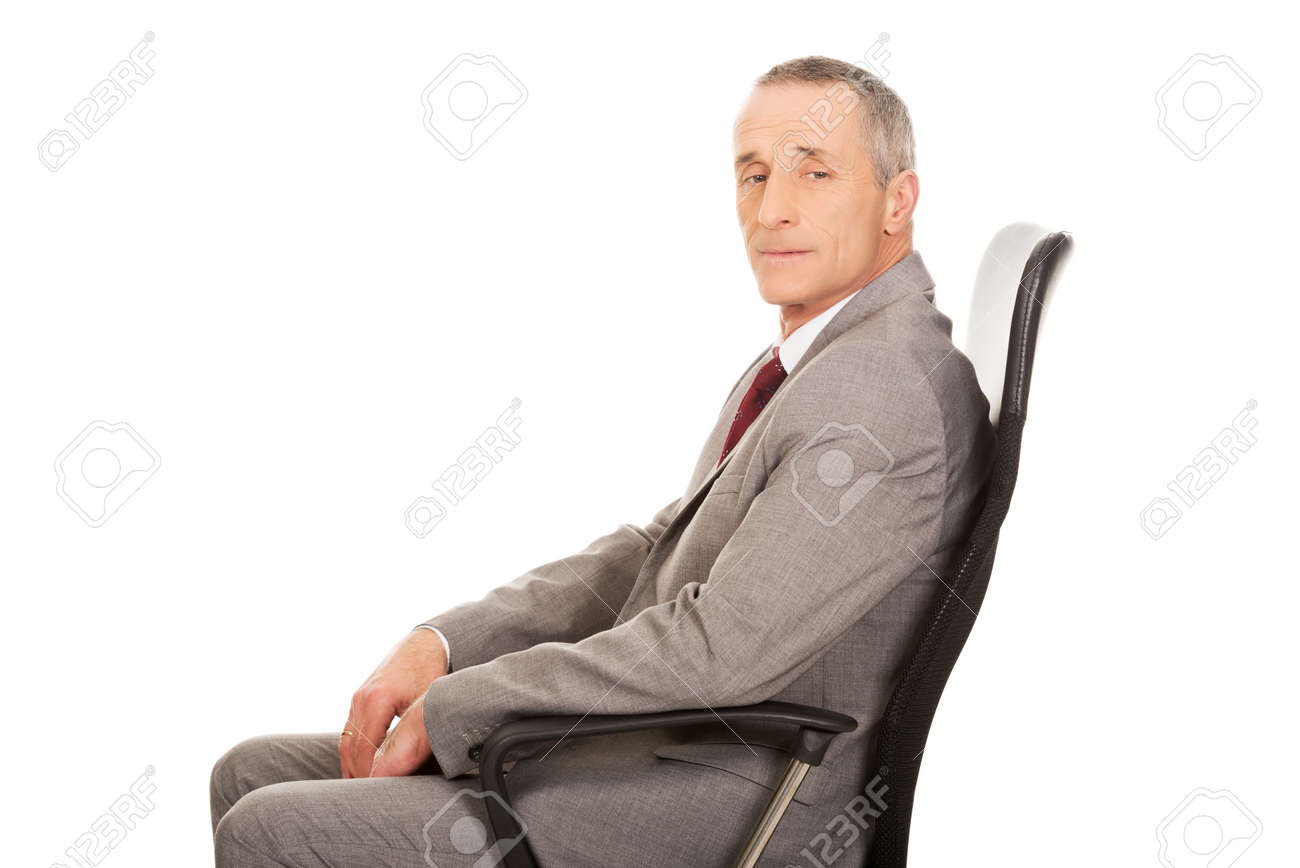 Side View Of Businessman Sitting On Armchair Stock Photo Picture And Royalty Free Image Image 36120344
