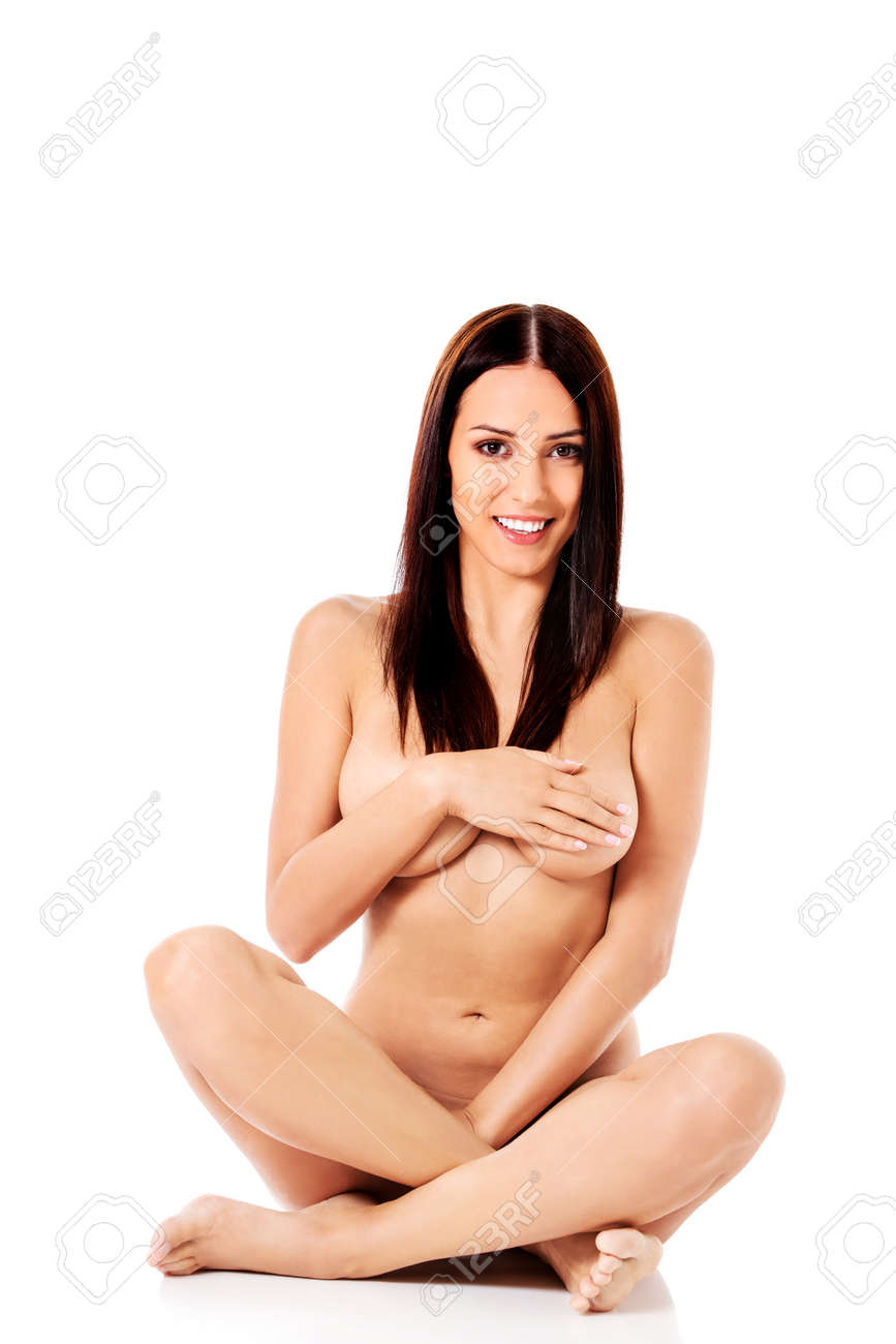 床にあぐらをかいて座っている裸の女性 の写真素材 画像素材 Image