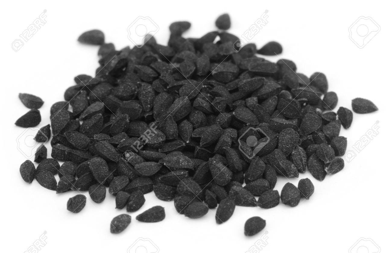 Nigella or Black cumin over white background - 20959545 Nigella or Black cumin over white background - 20959545