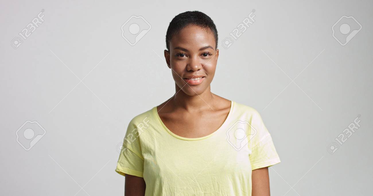 Pretty Mixed Race Woman With Short Hair In Studio Shoot Stock