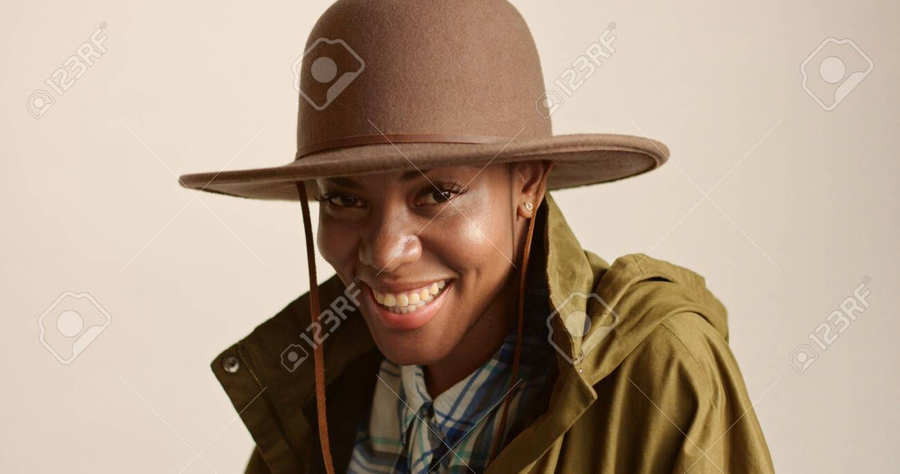 Pretty Mixed Race Woman With Short Hair In Autumn Outwear And